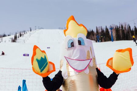 Sheregesh, Kemerovo region, Russia - April 7, 2018: Young people in carnival costumes on the...