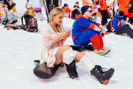 Sheregesh, Kemerovo region, Russia - April 7, 2018: Young people in carnival costumes on the mountain slope.のeditorial素材