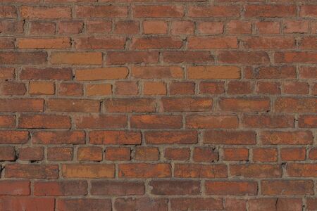 Background of old brown brick wall texture