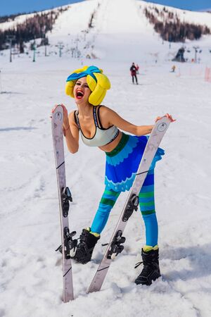 Sheregesh, Kemerovo region, Russia - April 12, 2019: Woman- participant of beauty contest Miss Sheregesh during Grelka Fest- a sports and entertainment activity for ski and snowboard riders in bikiniのeditorial素材