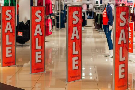 Entrance in shop with a sale sign. Sale in a shopping mallの写真素材