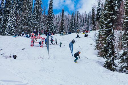 Sheregesh, Kemerovo region, Russia - April 08, 2019: Jaws Slash Camp is a snowboard and mountain ski...