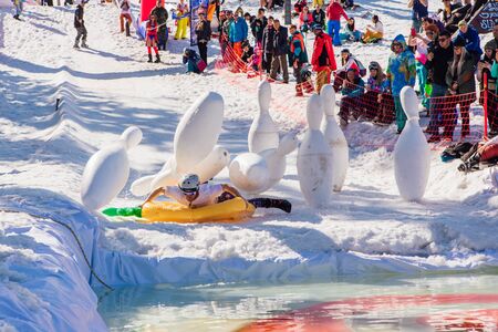Sheregesh, Kemerovo region, Russia - April 13, 2019: Pool and ride contest where people on a...
