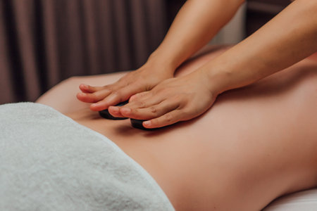 Thai massage with hot volcanic stonesの写真素材