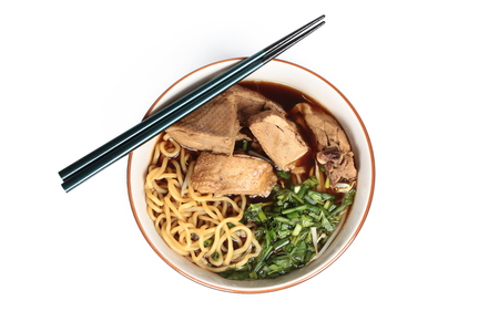 Steam duck and ramen in brown sauce isolated on white background.の写真素材