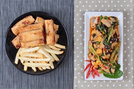 Chinese Vegetable festival  food as fried basil with mixed vegetables served deep fried spring roll...