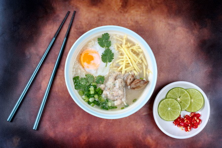Rice porridge with mined pork and chicken lever served  spicy sour filling.の写真素材