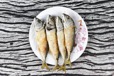 Deep fired streamed - mackarel on dish.の写真素材