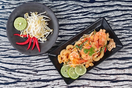 Thai fried macaroni with shrimp , call Pad Thai Macaroni in Thai,served with side dishの写真素材
