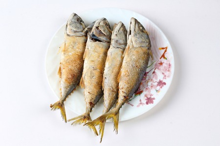 Thai food,Deep fired streamed - mackarel on dish.の写真素材