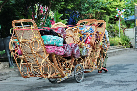 Chapman folk basketry furniture dragged by the wayside at Bangkok,Thailandの写真素材