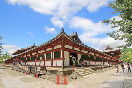 Nara,Japan-June 26 , Tourists look for trading ticket to visit inside of  Todaiji temple  in bright sky day,the world's largest wooden building , on June 26,2016 in Nara,Japanのeditorial素材