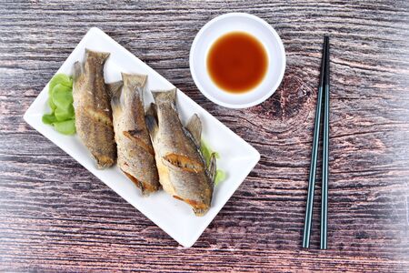 Thai food , Deep fried small snapper with bean sauce.の写真素材