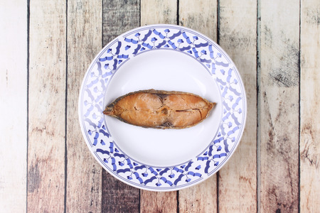 Deep-fried dried salted sea fish,Spotted mackerels in Thai pattern dish.