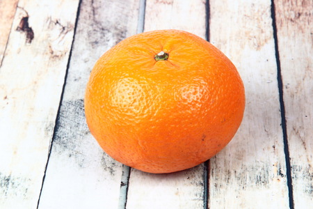 Golden orange on wood, to celebrate the blessing. According to the beliefs of the in China. To give life and trade flourished.の写真素材