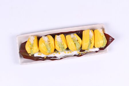 Thai dessert ,Jackfruit wrap the green and white of sticky rice in coconut milk  call Khao Neauw...