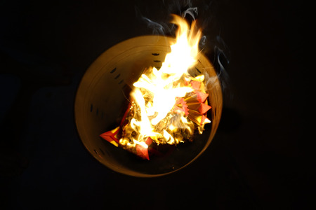 Chinese culture , Chinese descendants  were burnt silver paper , gold paper  and hell money for ancestors who have passed away.の写真素材
