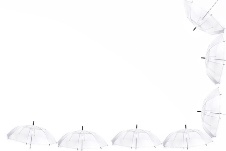 Transparent umbrella on white background. Have a text space.の写真素材