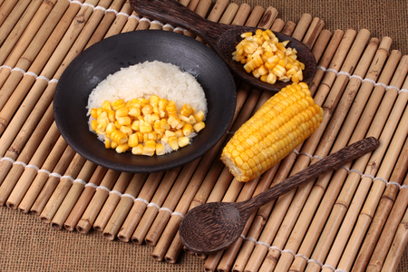 Thai dessert ,Delicious streamed sweet corn with sweet sticky rice in coconut milk call Khao Neauw Khao Pod in Thai,and kitchen equipment cooking.の写真素材