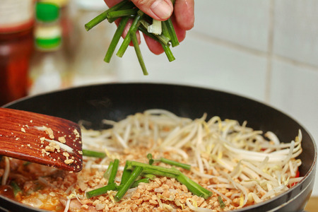 Popular Thai recipe,Pad Thai with Crisy wonton and chicken ,bean sprouts topped halve lemon call Pad...