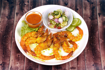 Charcoal boiled prawn satay, homemade, served with cucumber chili sauce as Ar Jad in Thai and nut sauce are popular Asia cuisine.の写真素材
