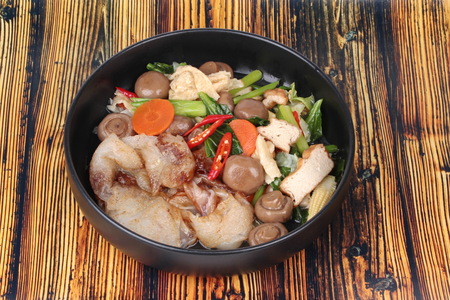 Chinese Vegetable festival  food as fried big noodle topped mixed vegetables call J food festival.