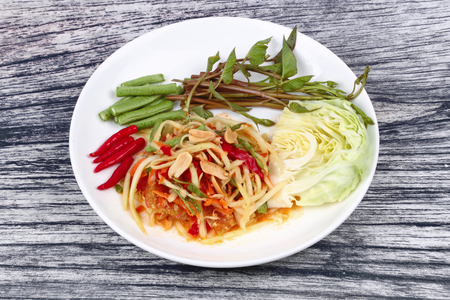 Chinese Vegetable festival as spicy papaya salad with mixed vegetable call Som Tum J in Thai .の写真素材