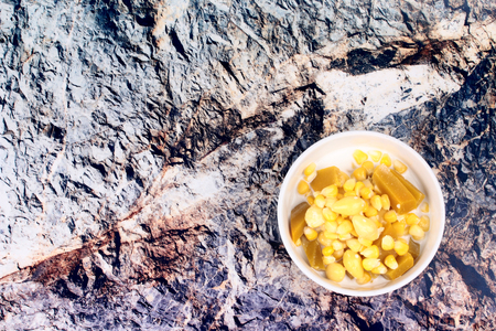 Thai Chinese dessert ,Delicious streamed sweet corn ,pumpkin and ginkgo in coconut milk .  Have a copy space in left.の写真素材