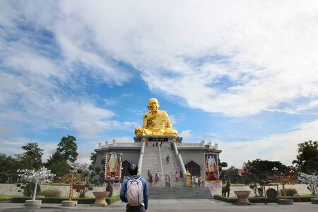 Rayong , Thailand , 27 May 2017, Backpacker visit beautiful buddhist place call Luang Poo Tim and cloudy sky at Wat  Lahanrai.のeditorial素材