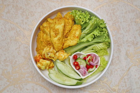 Homemade Charcoal boiled chicken and prawn satay, served with cucumber chili sauce as Ar Jad in Thai and nut sauce are popular Asia cuisine.の写真素材