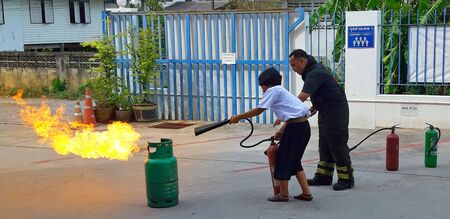 Bangkok, Thailand - 7 May 2019 : Emergency experts to do the training and introduction to office staff  made recommendations for training in fire fighting techniques.のeditorial素材