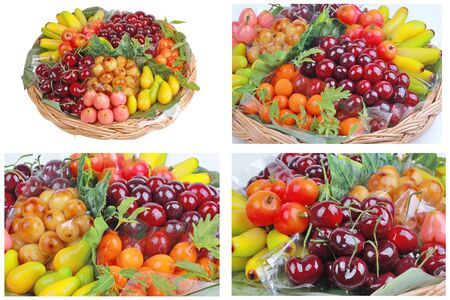 Isolated of popular Thai dessert in colorful Deletable imitation fruits,Mung beans that make to fruit-shaped and coated with thin layer of jelly,Fruit Shaped Mung Beans call Kanom Look Choup in Thai.の写真素材