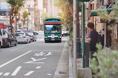 Kobe,Japan,15 July 2019,Tourist city loop bus of Kobe ,Traditional bus shuttle  reconnoitre the town transfer station on tourist attractions of the city.のeditorial素材