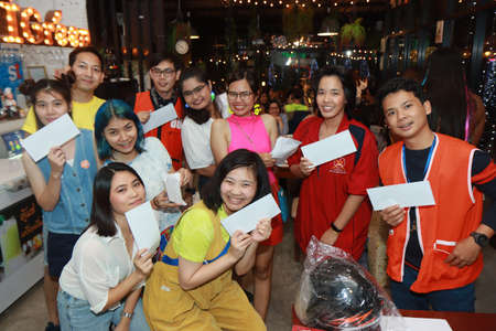 Bangkok,Thailand,21 Dec 2019,
Office employees celebrate the new year party by wearing a sports dress contest. Join the singing and give away prizes in the karaoke room with beautiful lighting.のeditorial素材
