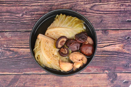 Streamed  gourd  wrap vermicelli ,shiitake mushrooms and minced chicken in Chinese bone soupの写真素材