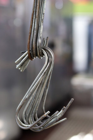 hanging metal butcher hooksの写真素材