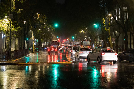 Avenida de Mayo in Buenos Aires on a rainy night with the reflections of the carsのeditorial素材
