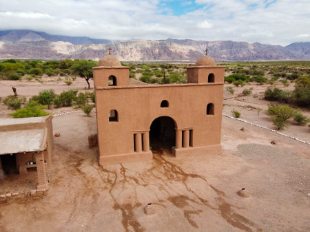 The majestic Church of the Virgin of Andacollo in La Falda, Catamarca, captured on a summer day with...