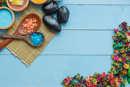 spa and massge items lay on blue wooden backgroundの写真素材