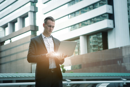 smart business man use laptop outdoor