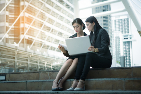 business meeting outdoor between asian womenの写真素材