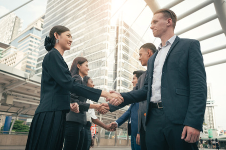 group of hand shake from business peoples after agreementの写真素材