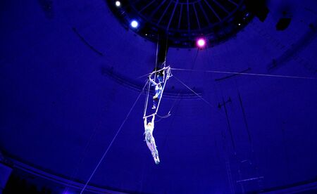 Minsk, Belarus, Belorussian State circus, 2012 circus performance  January 7  2012: couple of acrobats under the roof of circusのeditorial素材
