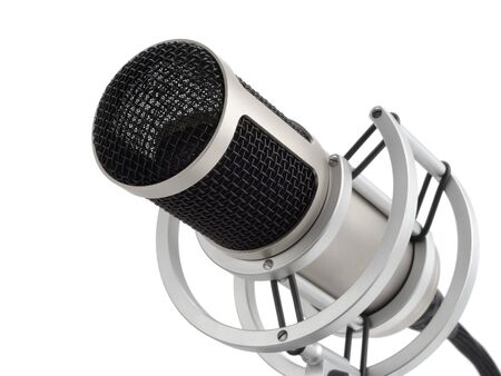 Studio shot of a professional microphone on pure white backgroundの写真素材