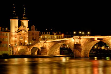Heidelberg, Germany, night shot of the illuminated historical "Old Bridge"の写真素材