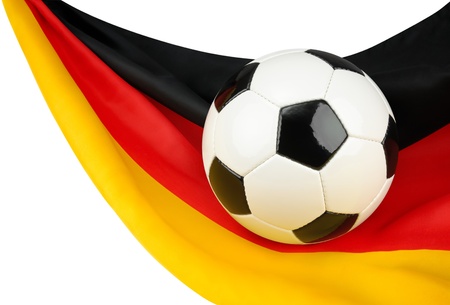Soccer ball on a German flag hanging in a spiffy way as a symbol for Germany's love of footballの写真素材