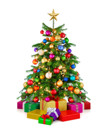 Joyful studio shot of a colorful lush Christmas tree shining in vibrant colors, with gold star on top and gift boxes arranged in front of it, isolated on pure white backgroundの写真素材