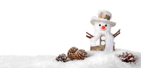 Cute happy snowman in the snow, studio isolated on pure white, ideal for Christmas or winter seasonの写真素材