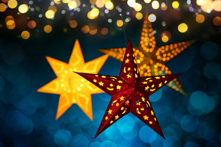 Hanging Christmas lantern stars with abstract blurred lights. Three illuminated ornamental pieces on...