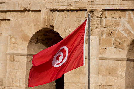 Flag of Tunisia in front of El Djem Colosseumの写真素材